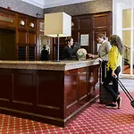 Отель The Metropole